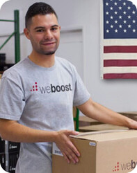 weboost employee holding box